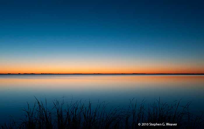 Dawn light over the lake at Cheyenne Bottoms Wildlife Area, Kansas