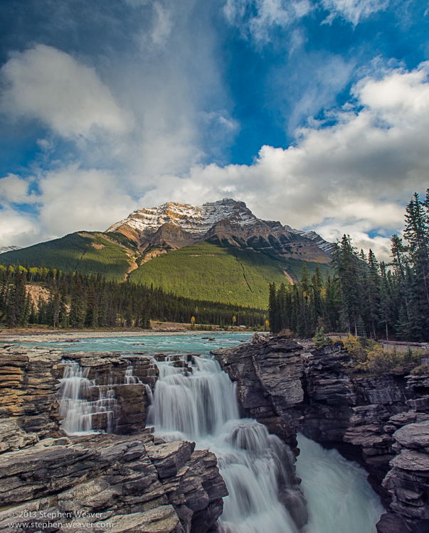 Mount Kerkislin rises over Athabasca Falls in Jasper National Park