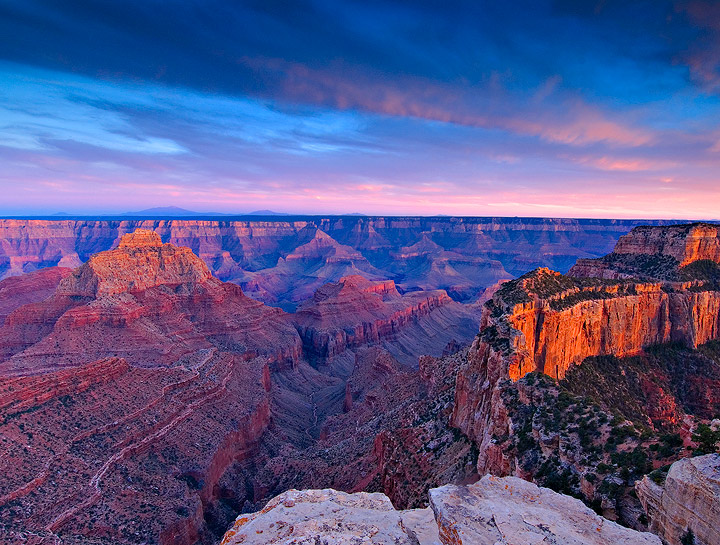 Spectacular sunset light illuminates Wotans Throne on the view from Cape Royal on the north rim of the Grand Canyon